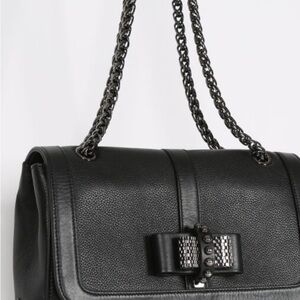 Christian Louboutin
Sweet Charity leather crossbody bag